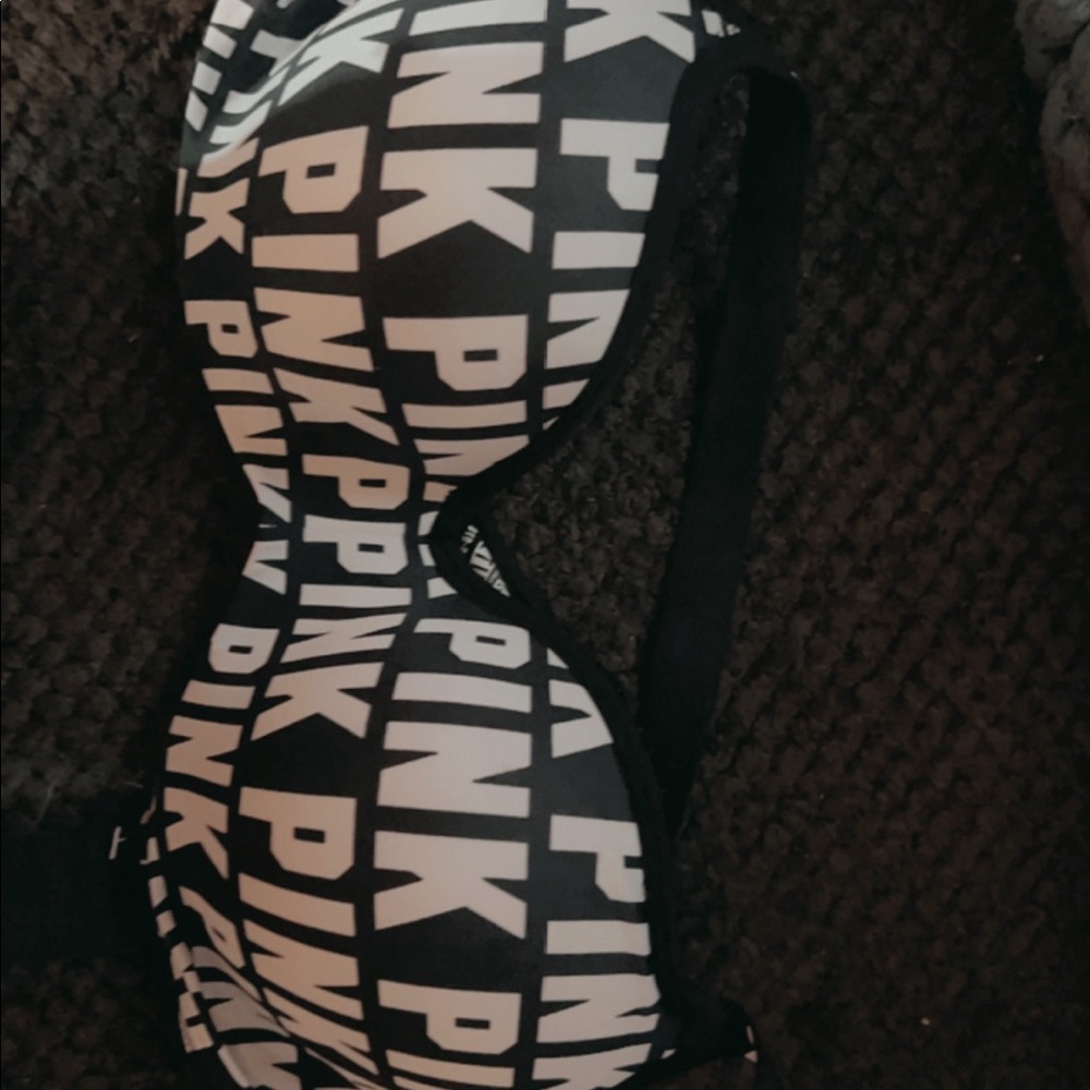Brand new Victorias Secret bra 32 DD. Dark blue with white letters.